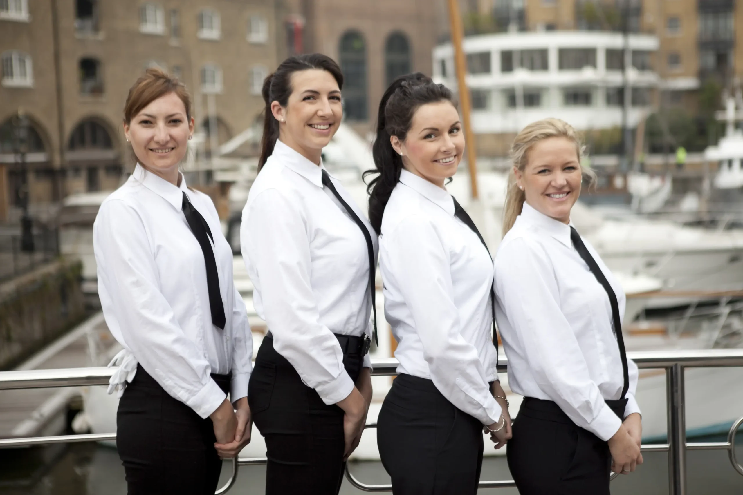 professional yacht crew in uniform preparing for interior service training