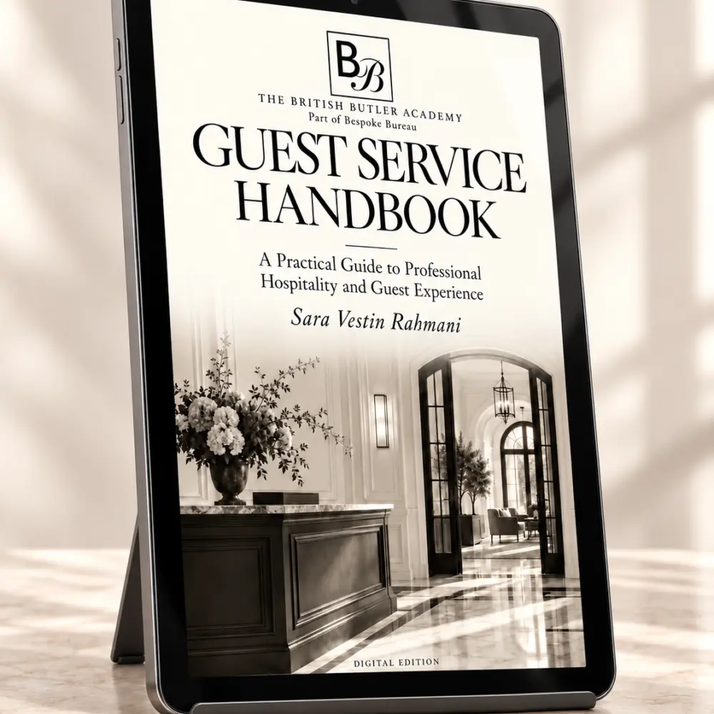 Guest Service Handbook shown on a tablet